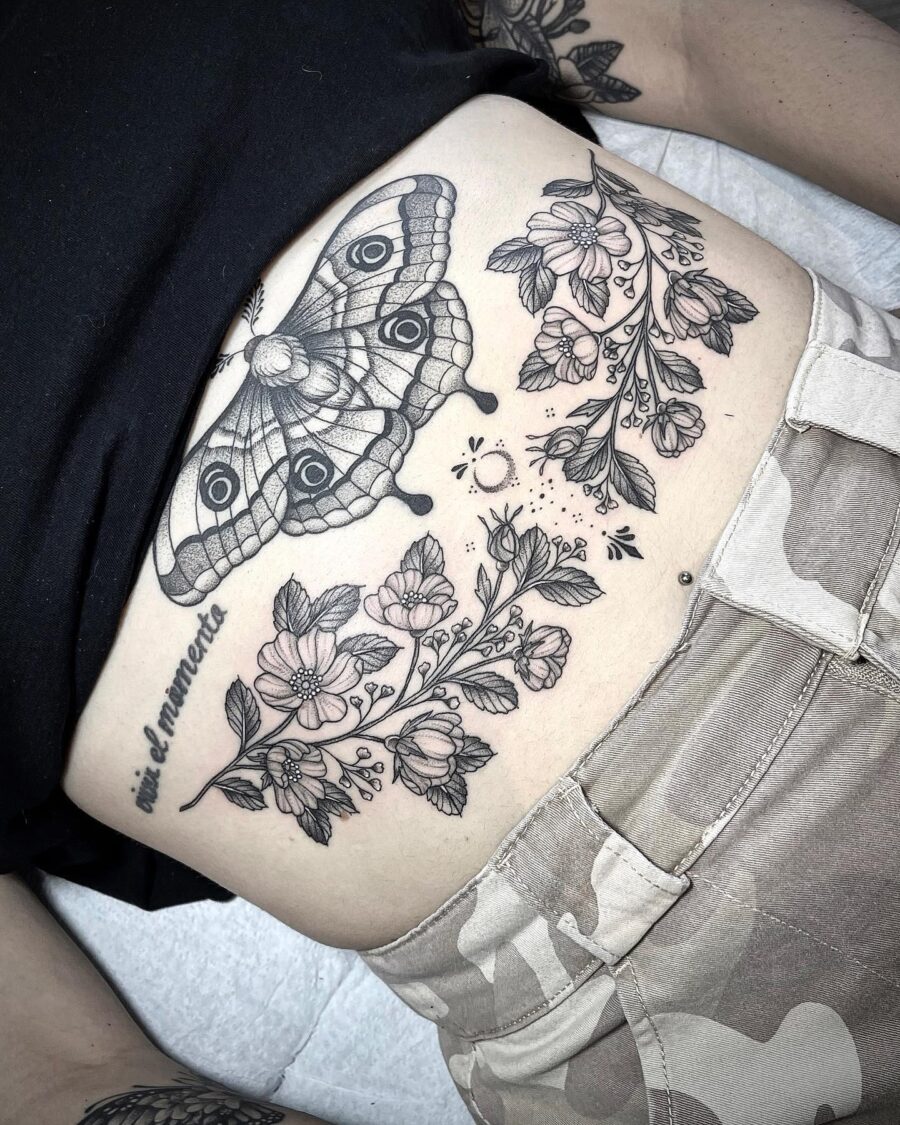 Intricate Moth and Floral Stomach Tattoo
