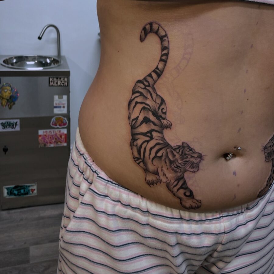 Dynamic Tiger Tattoo on the Stomach