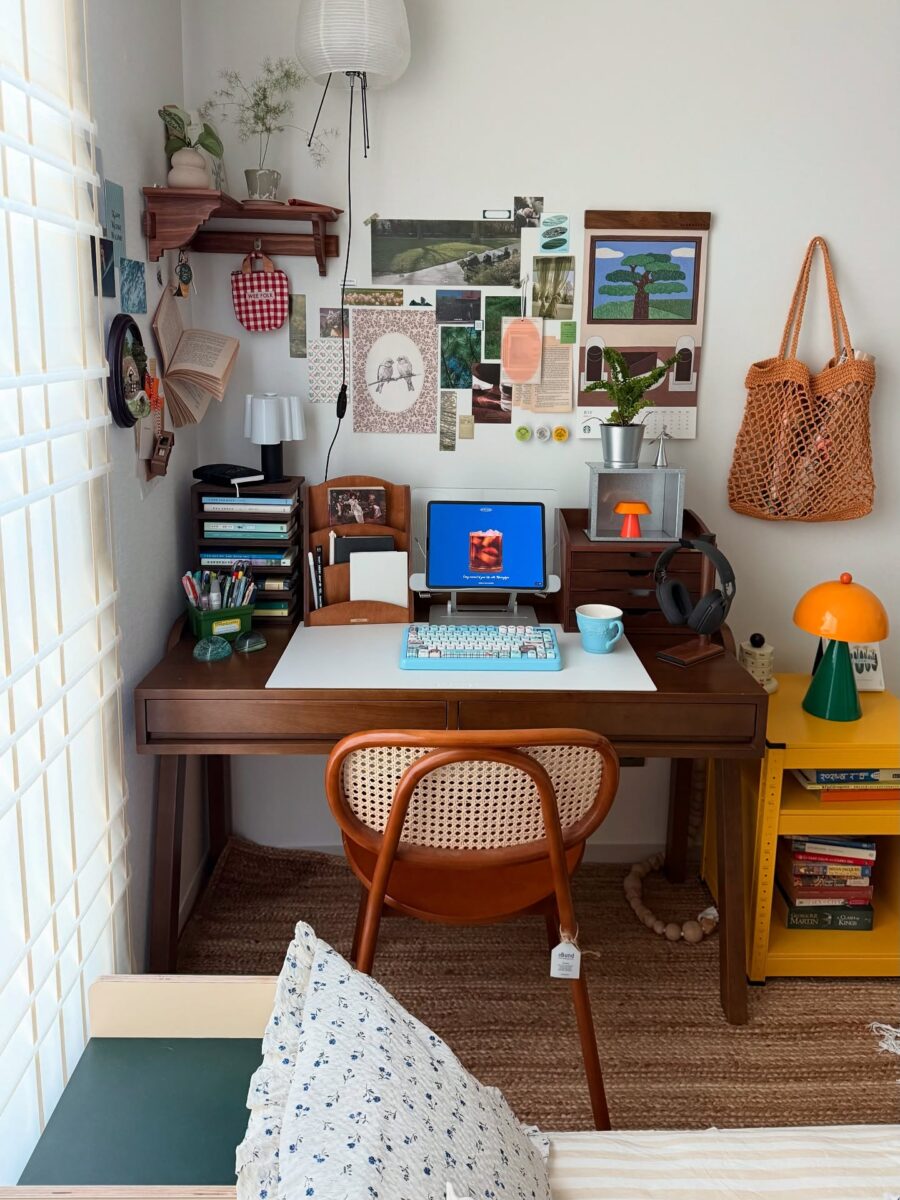 Stylish study desk with cozy decor accents