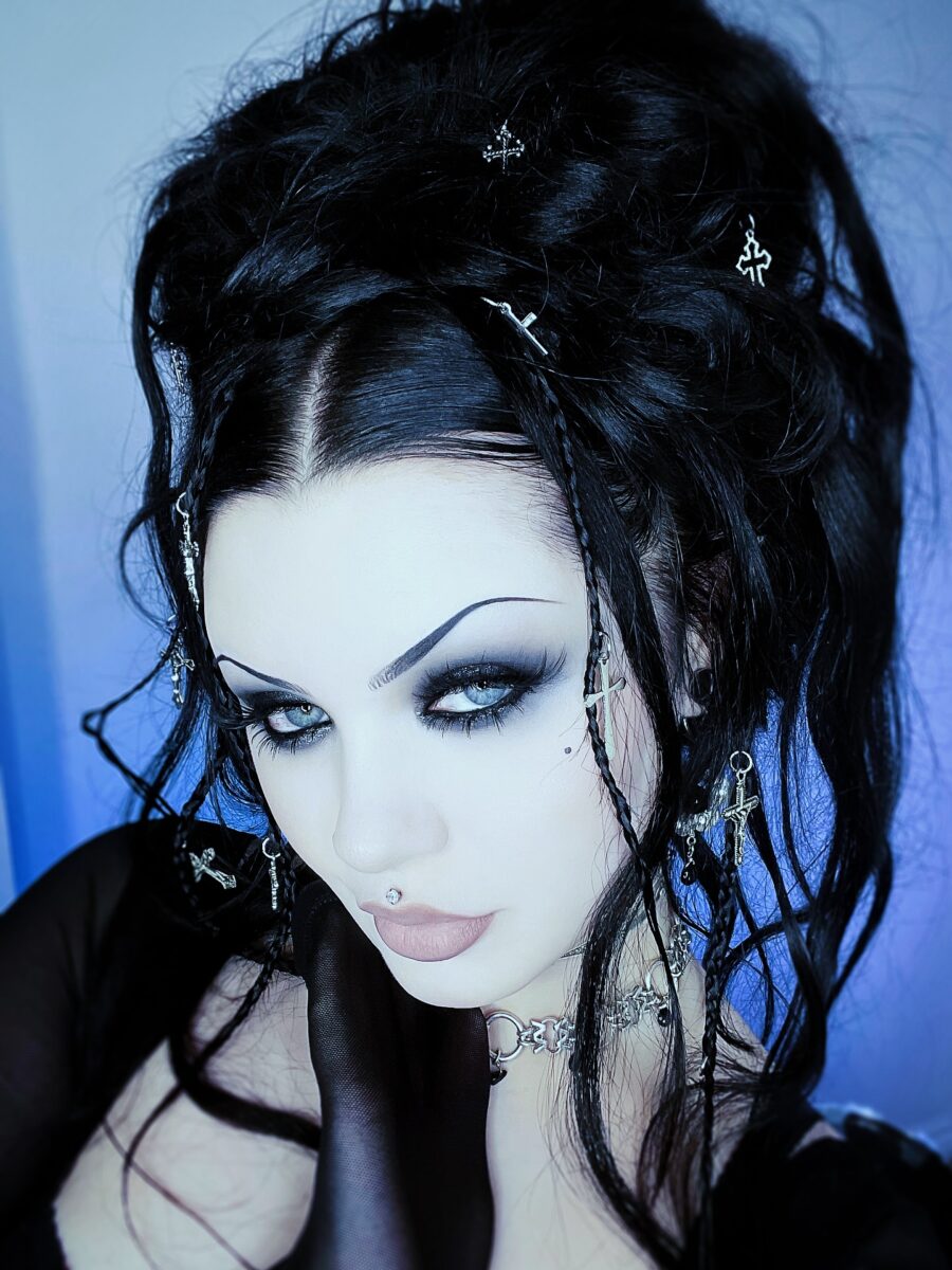 Dramatic trad goth makeup with bold accents