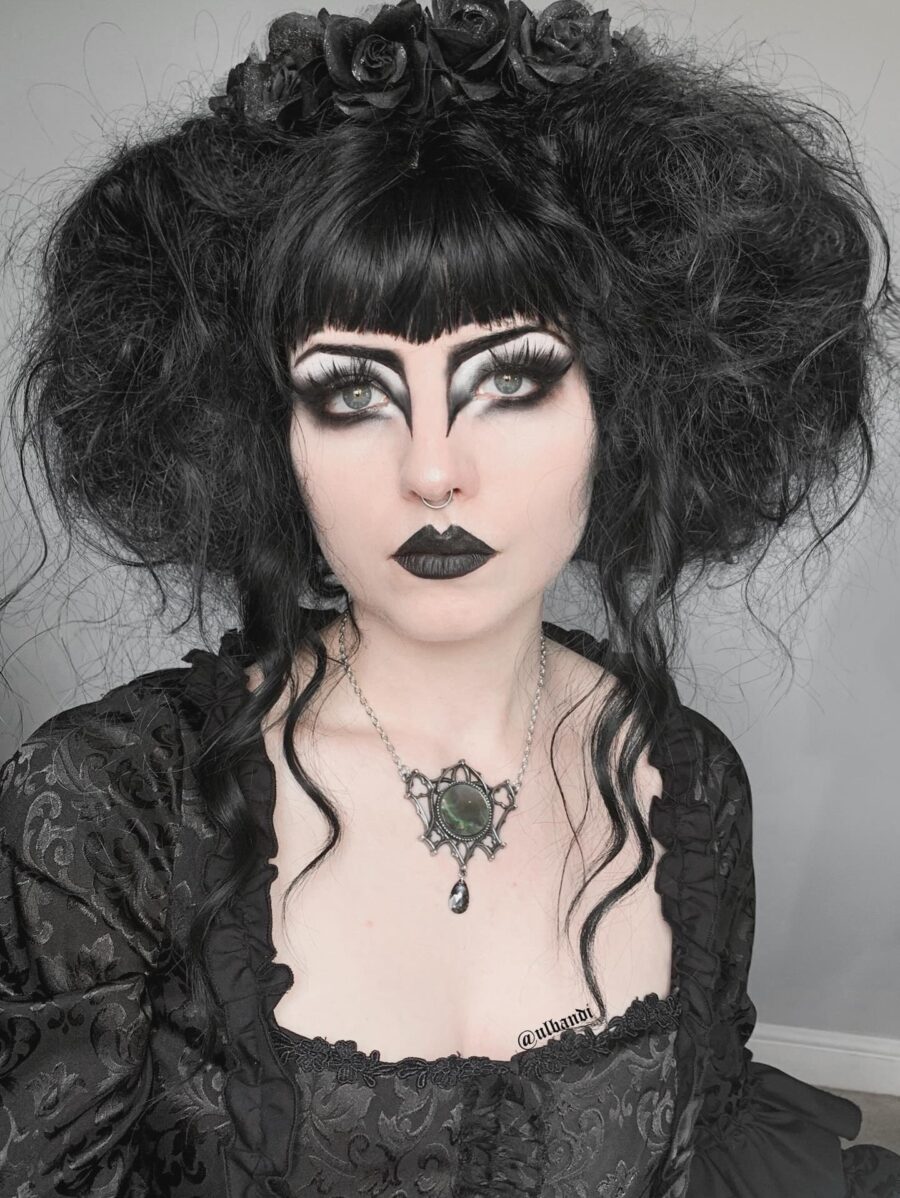 Dramatic black lips and vintage-inspired elegance