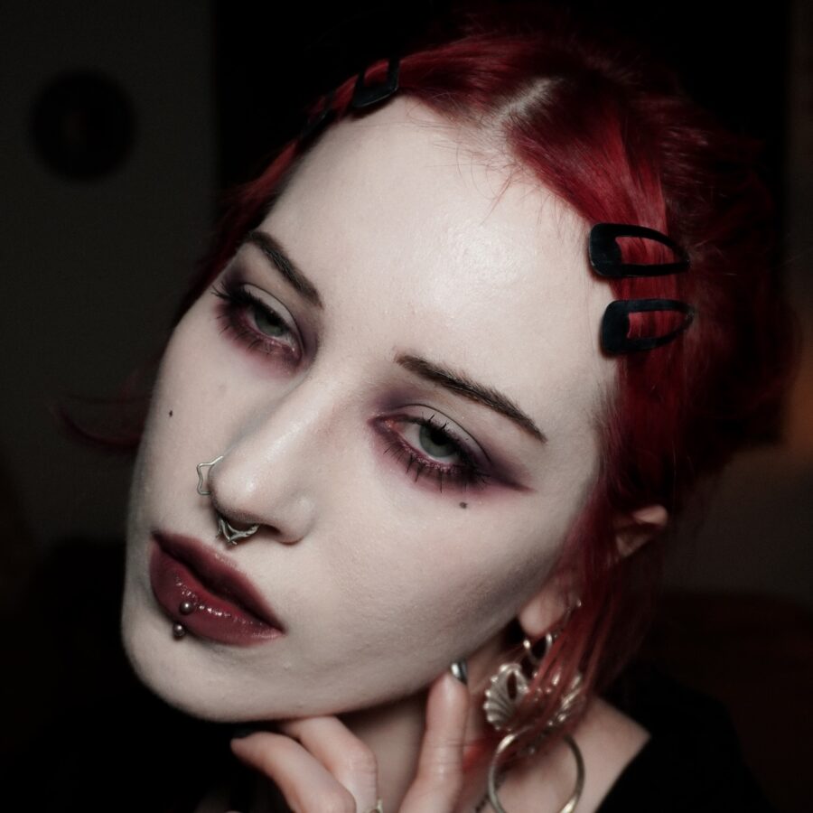 Bold goth look with dark hues and striking lips