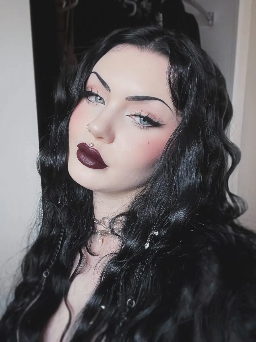 Bold dark lips and ethereal gothic vibes