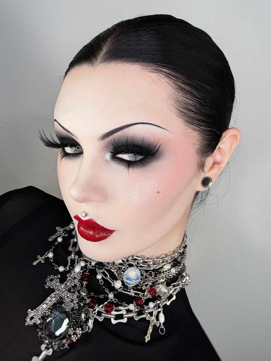 Striking trad goth makeup with bold features