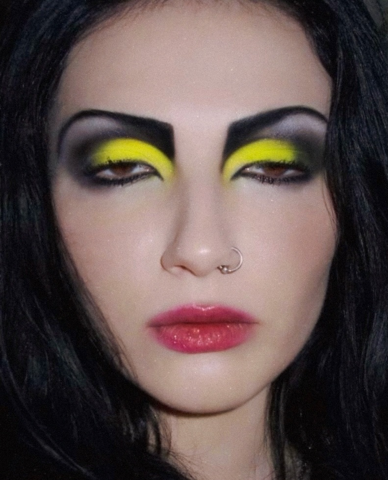 Striking Yellow and Black Goth Makeup Look