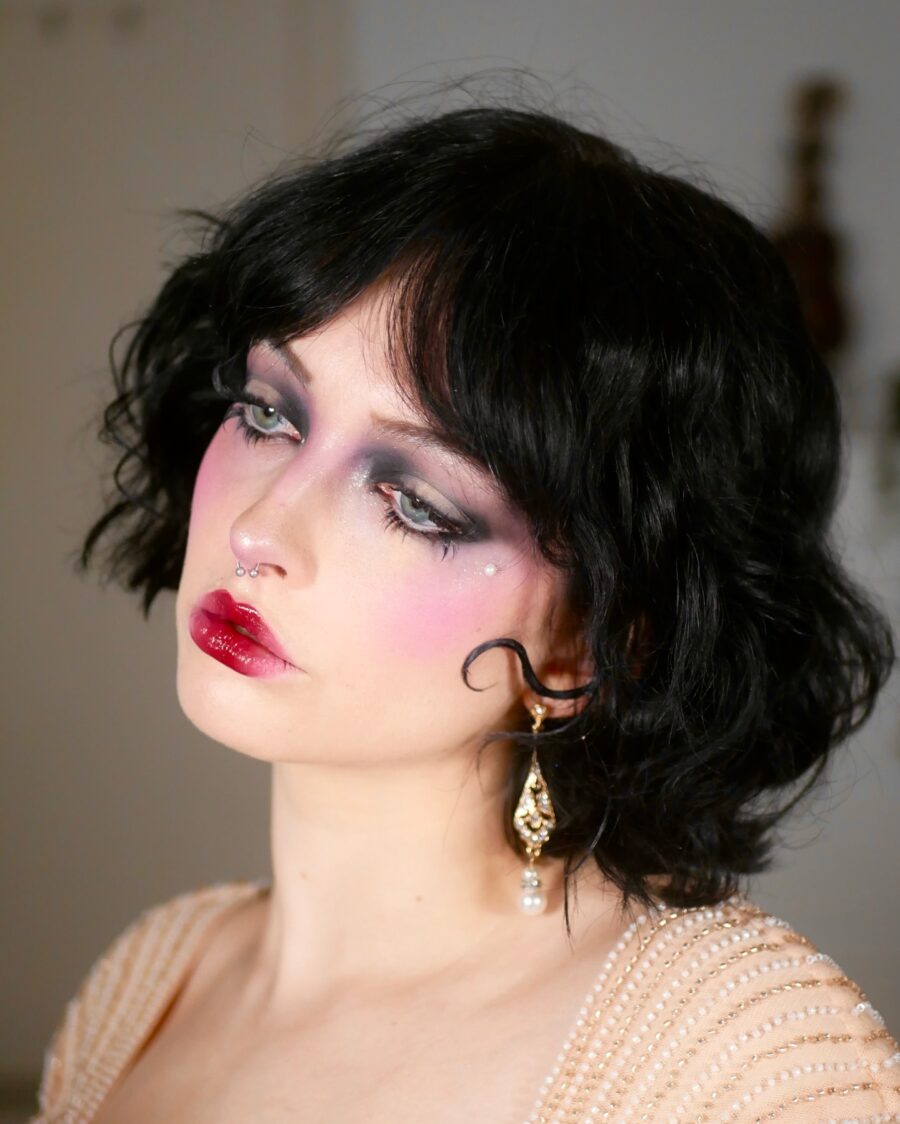 Dramatic trad goth makeup with bold accents
