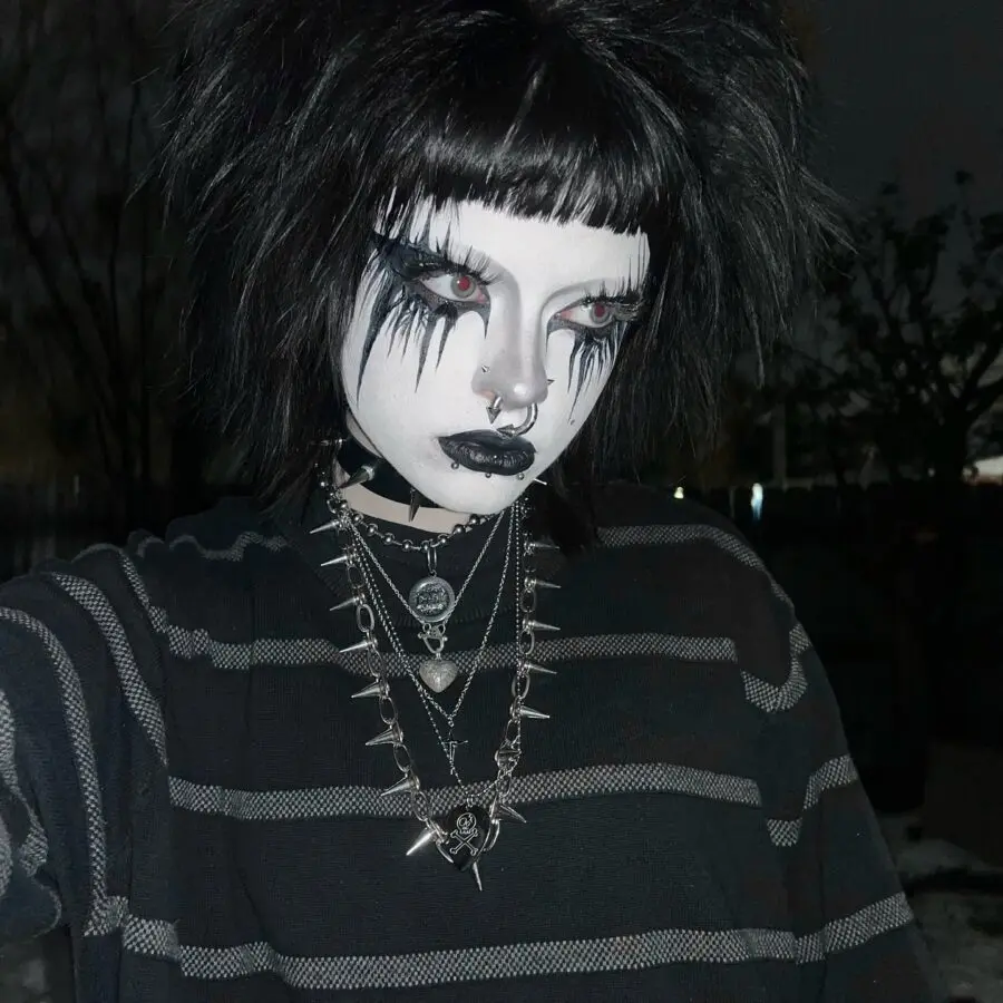 Dramatic black and white trad goth makeup look