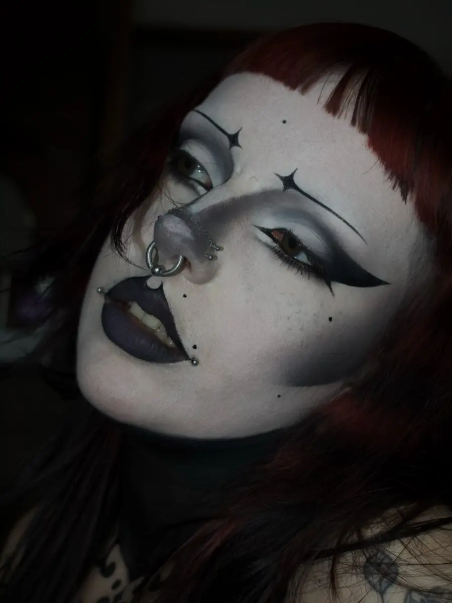 Striking pallid look with dark accents