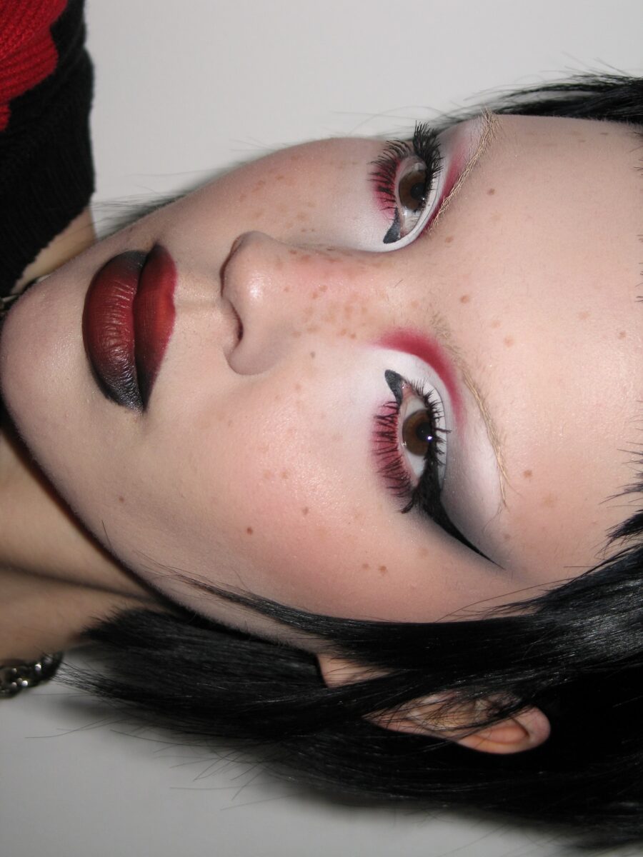 Bold red and black gothic makeup look