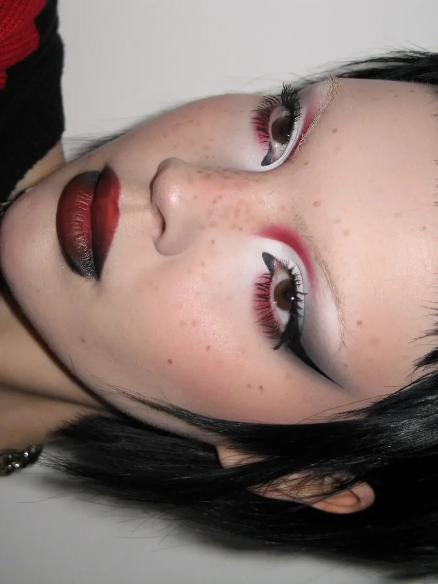 Bold red and black gothic makeup look