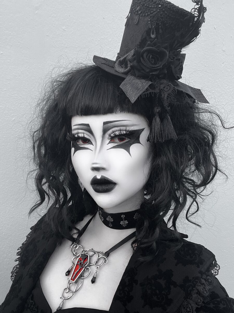 Striking vintage gothic makeup with accessories