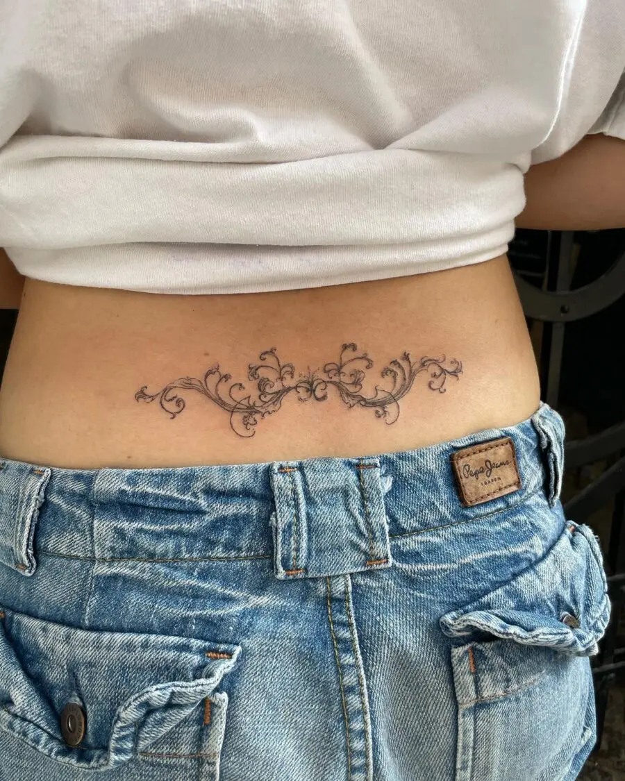 Elegant floral vine design on lower back