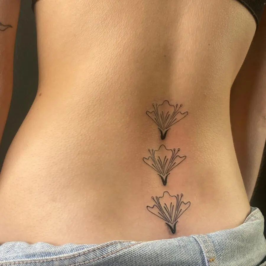Stylish floral tramp stamp tattoo design