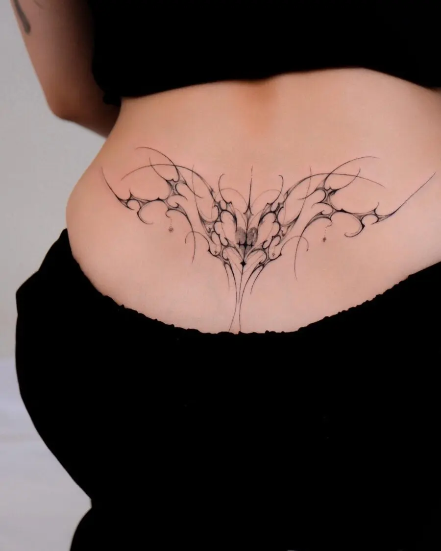 Elegant butterfly tramp stamp tattoo design