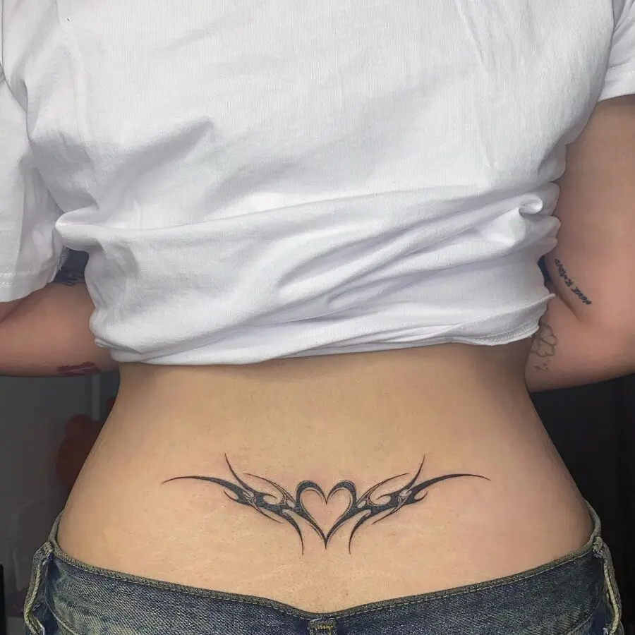 Stylish heart-shaped tribal tattoo design