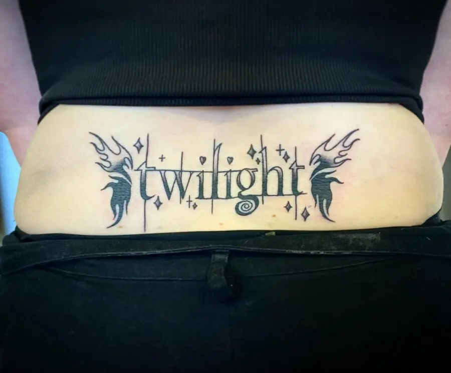 Elegant twilight-themed tramp stamp tattoo design