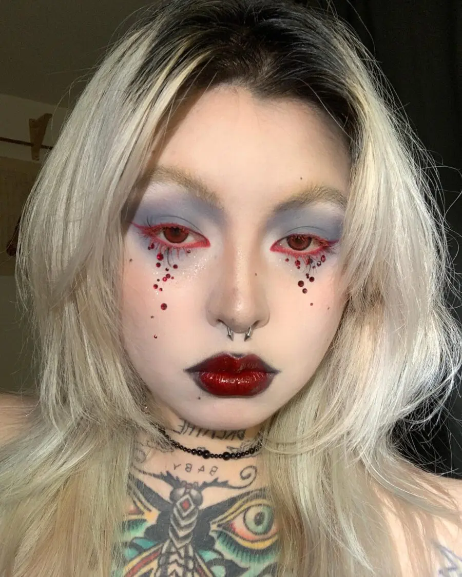 Gothic vampire look with dramatic blood tears