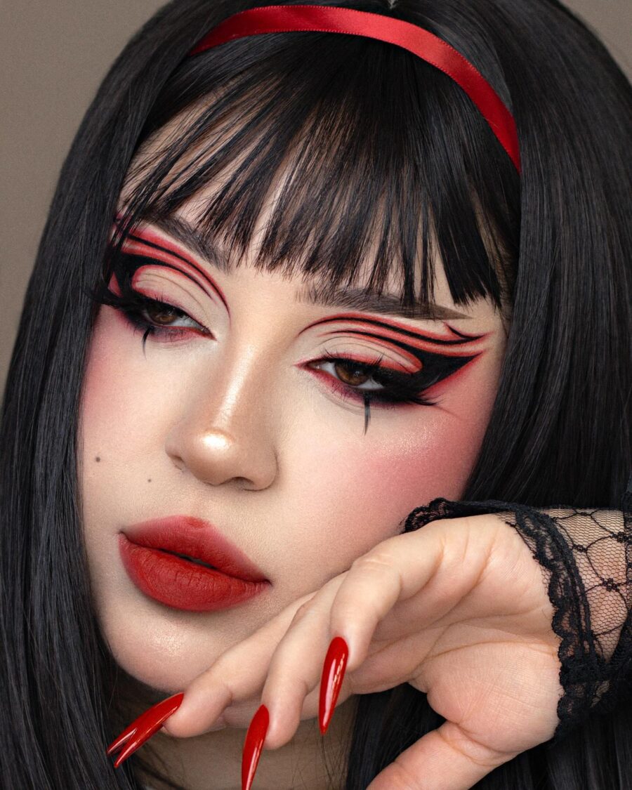 Bold red and black vampire makeup look