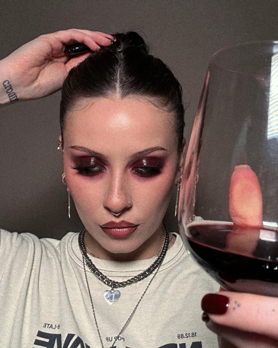 Glamorous vampire-inspired makeup with deep hues