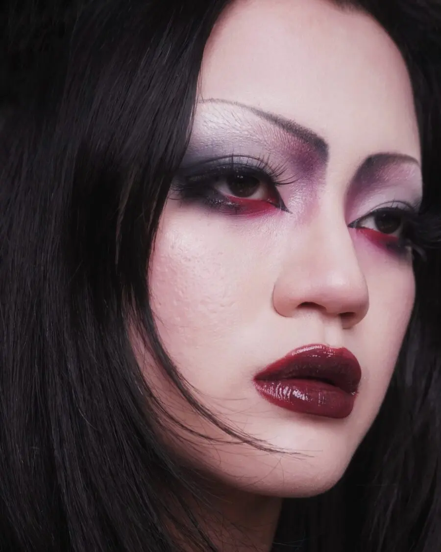 Dramatic vampire look with bold colors