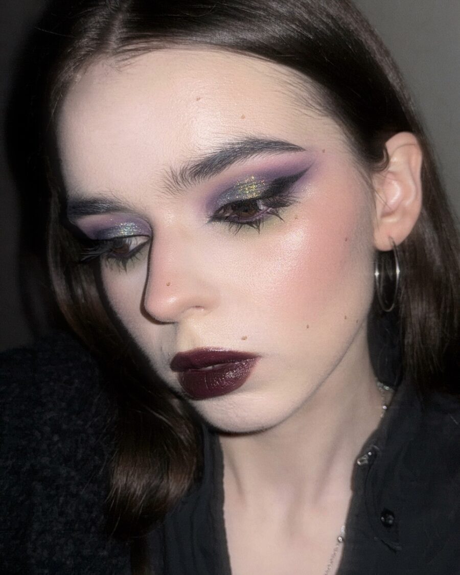 Gothic glam with purple lips and dramatic eyes
