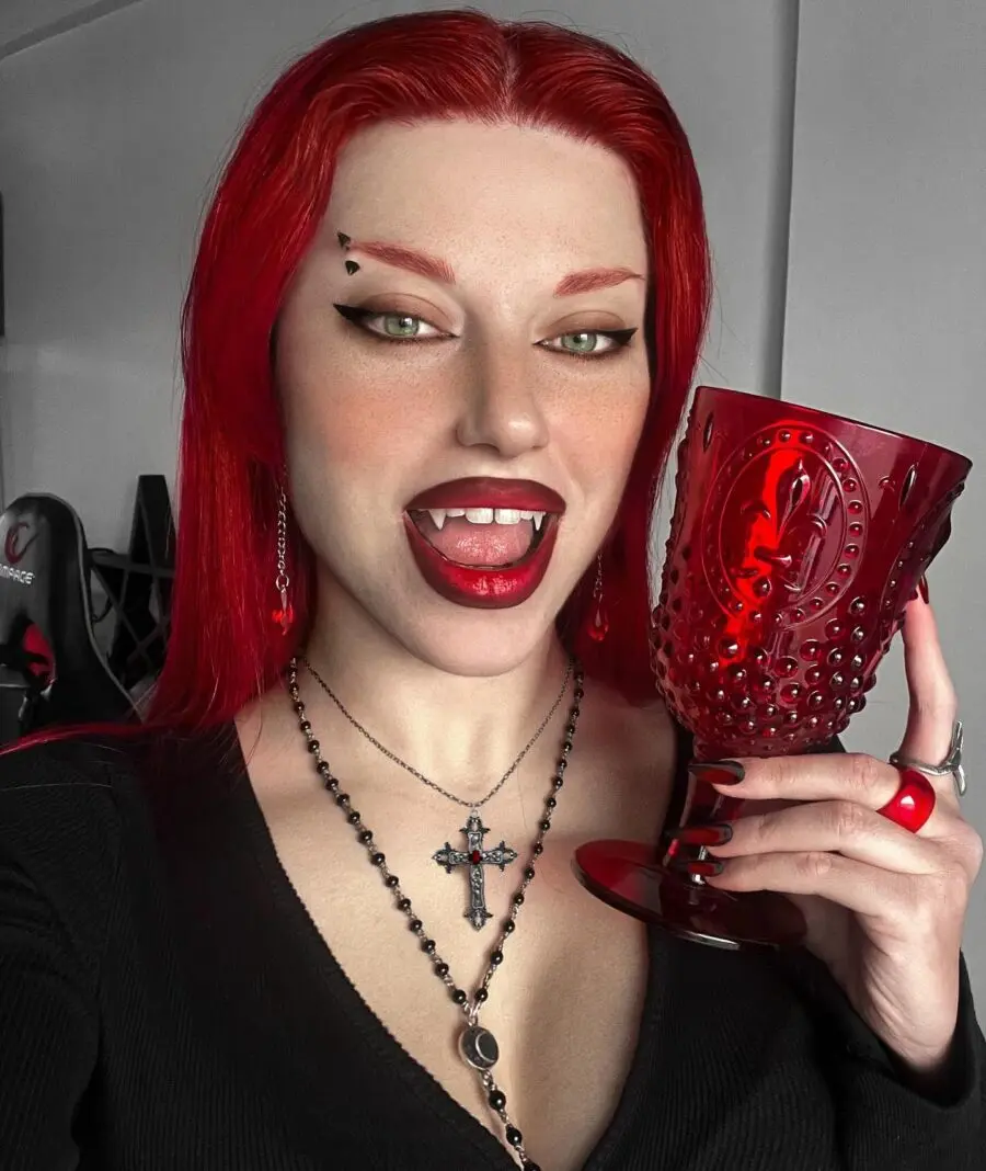 Glamorous Gothic Look with Red Accents