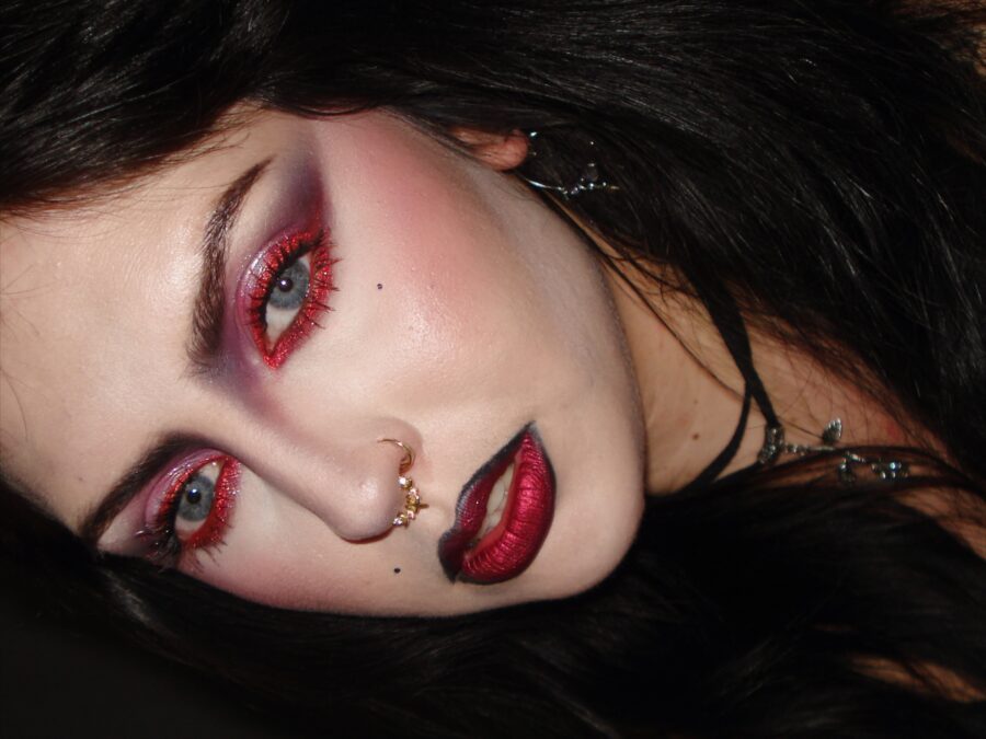 Dramatic vampire-inspired red and black makeup