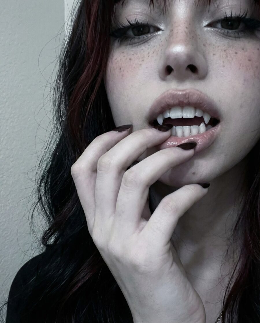 Edgy vampire makeup with stunning fangs