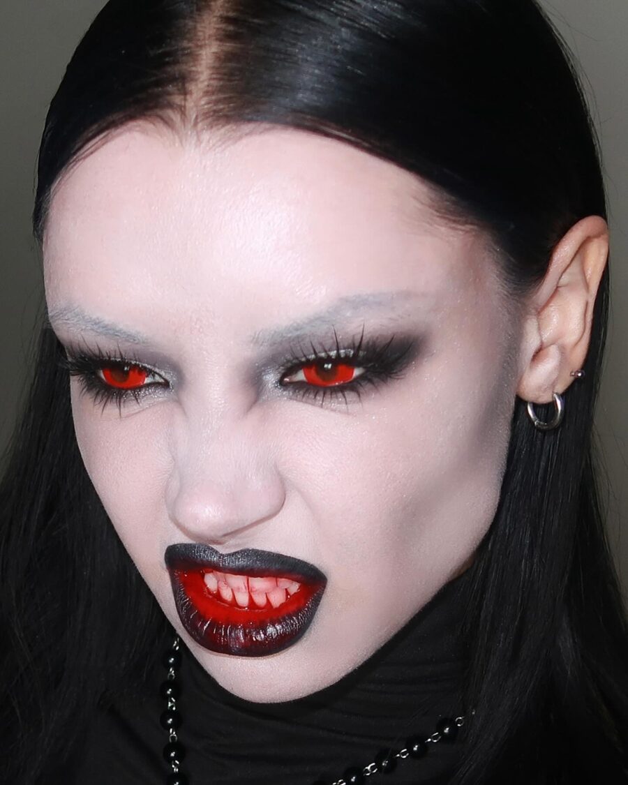 Bold vampire makeup with fierce red accents