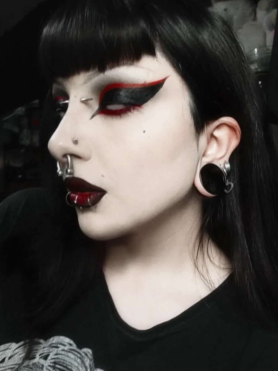 Dramatic vampire-inspired makeup with bold lips