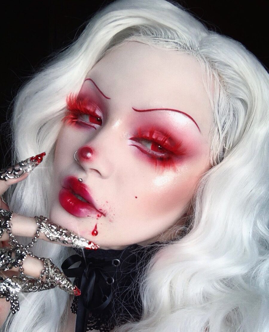 Glamorous vampire look with striking red accents