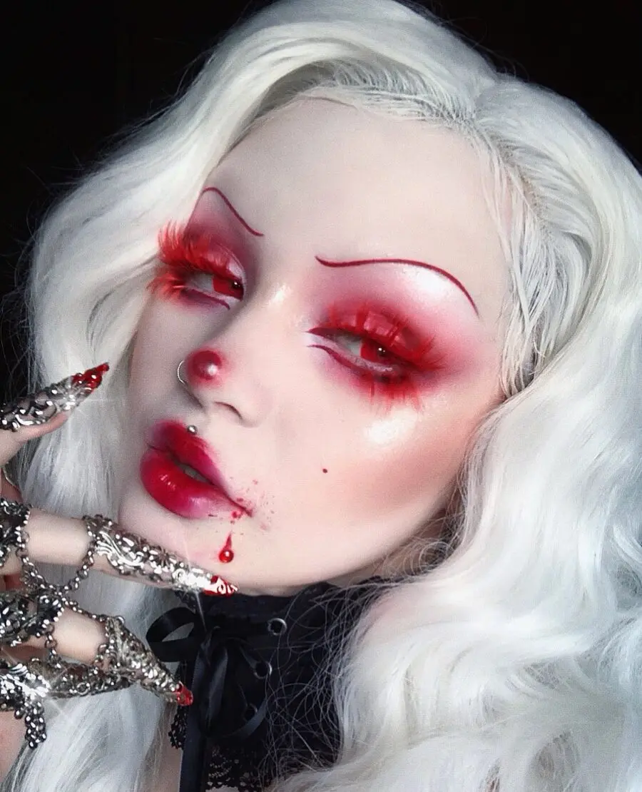 Glamorous vampire look with striking red accents