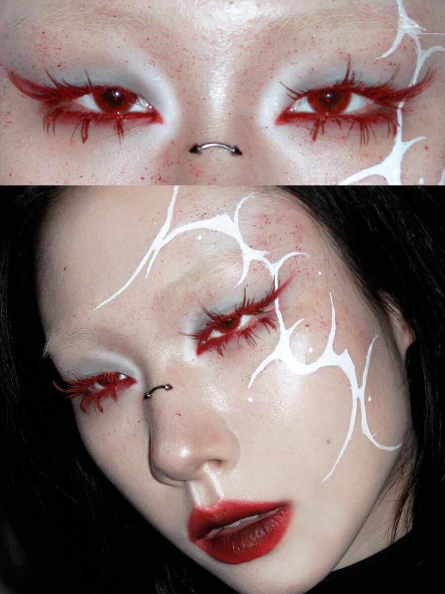 Striking vampire makeup with red and white accents