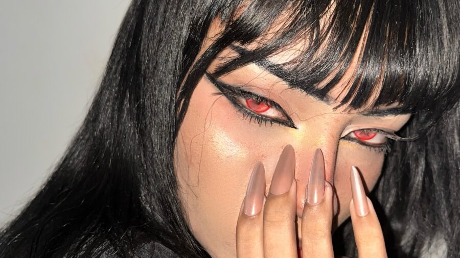Intense red-eyed vampire makeup look