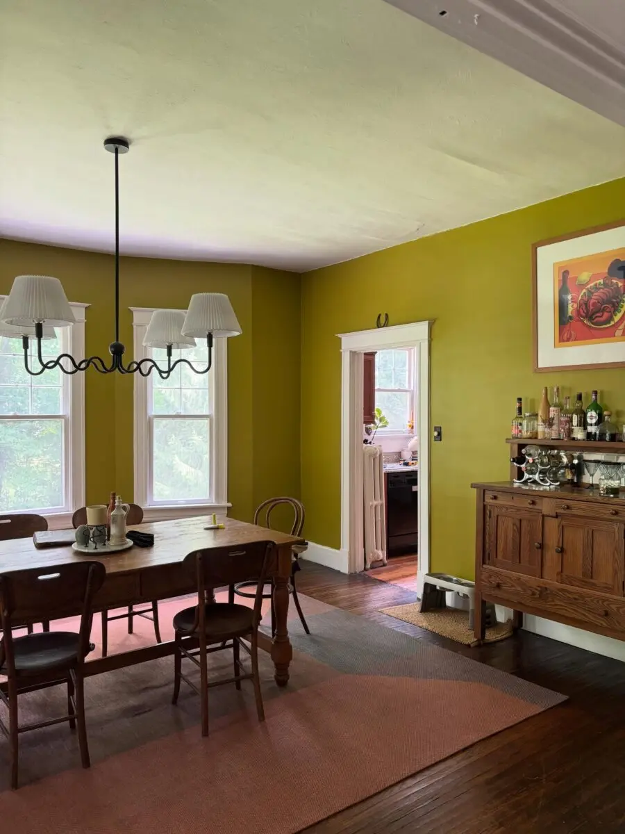 Vibrant green walls enhance dining atmosphere