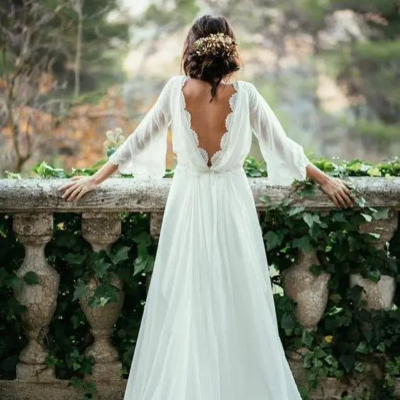 Elegant wedding dress with flowing sleeves
