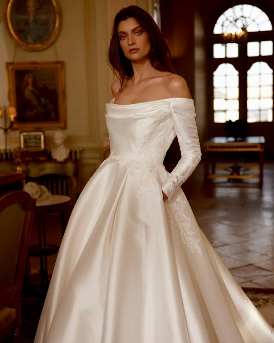 Elegant satin wedding dress with off-the-shoulder sleeves