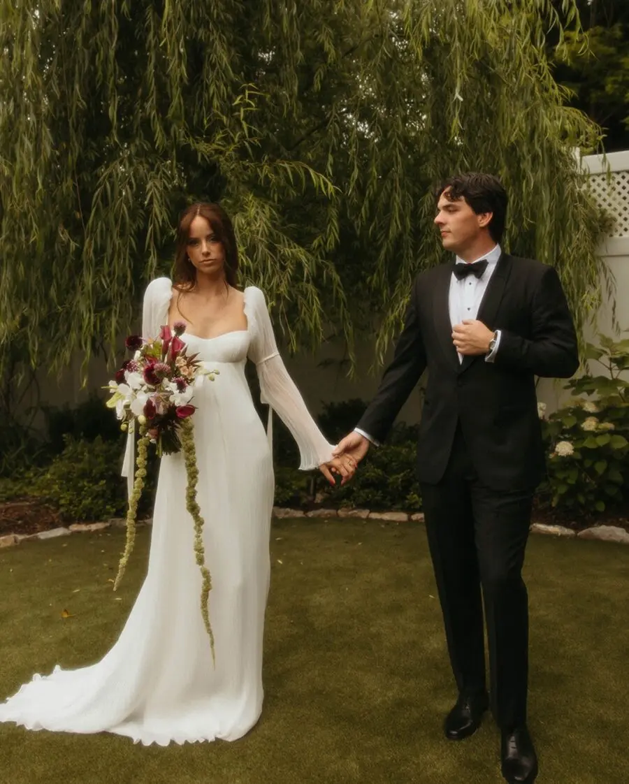 Elegant wedding dress with flowing sleeves