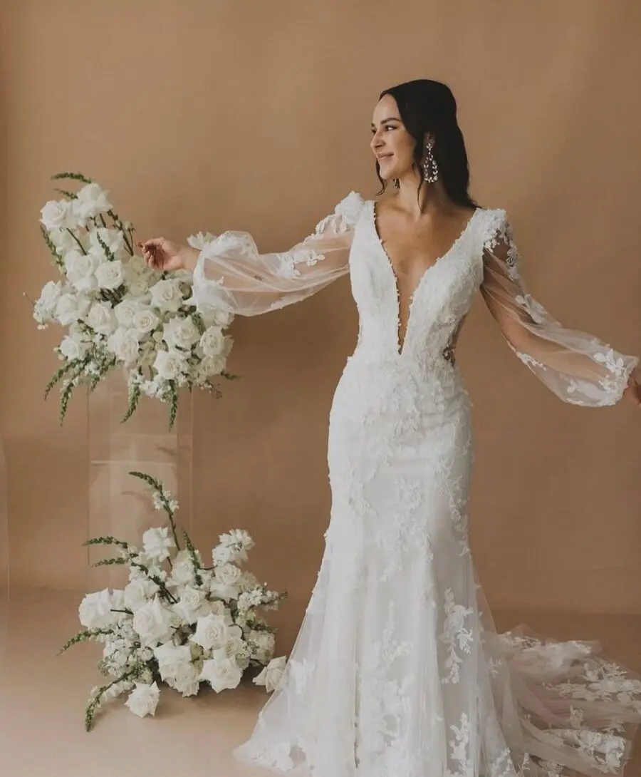 Elegant wedding dress with flowing sleeves