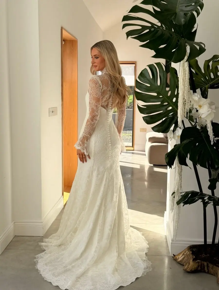 Elegant wedding gown with lace sleeves