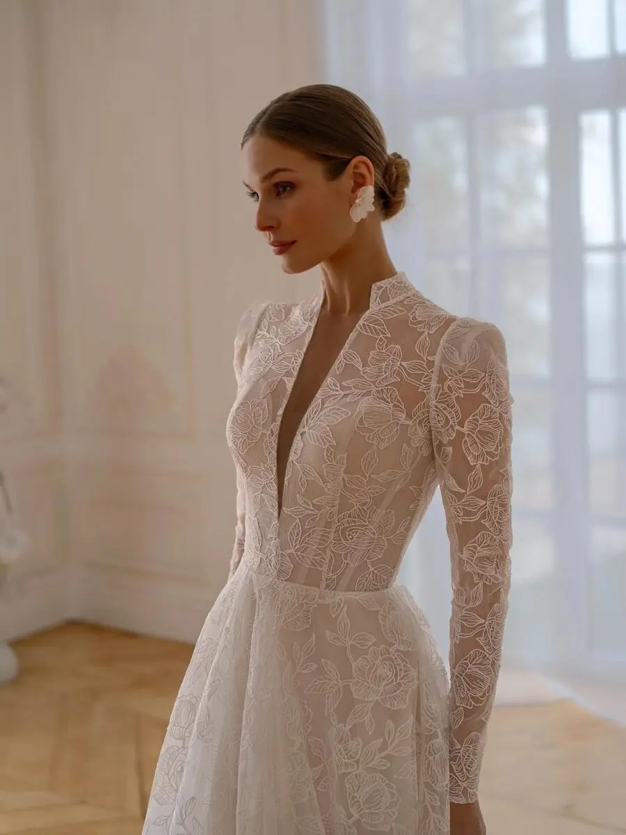 Elegant wedding dress featuring long lace sleeves