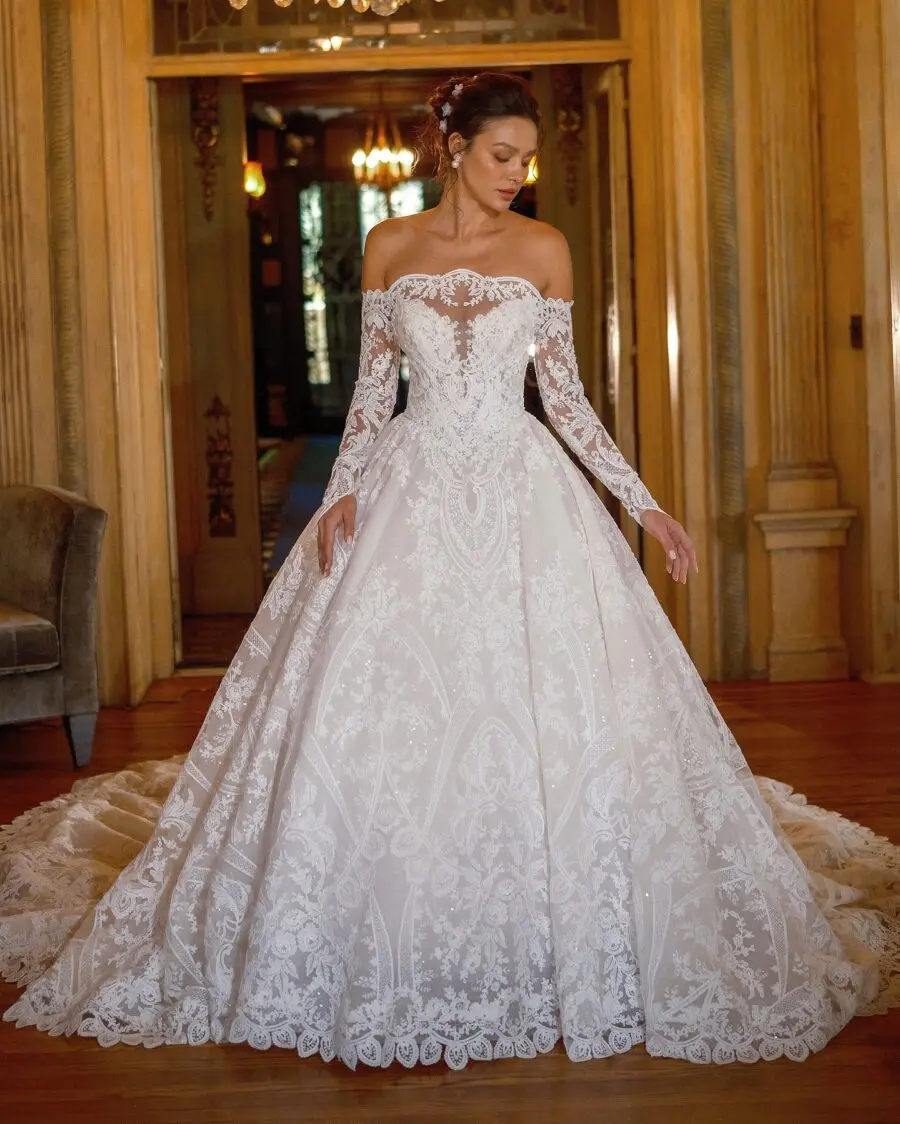 Elegant gown featuring intricate lace sleeves