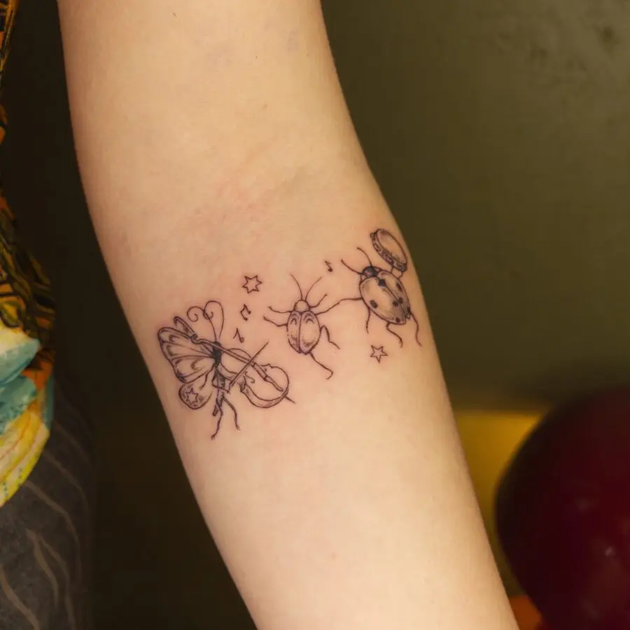Charming Insect Tattoos with Whimsical Flair
