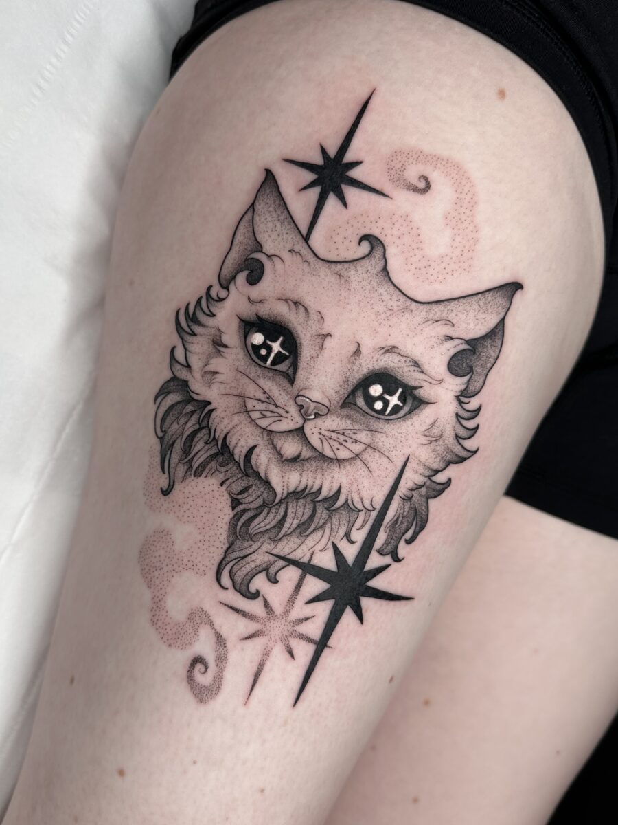 Charming Cat Tattoo Infused with Cosmic Vibes