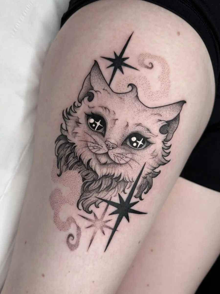 Charming Cat Tattoo Infused with Cosmic Vibes