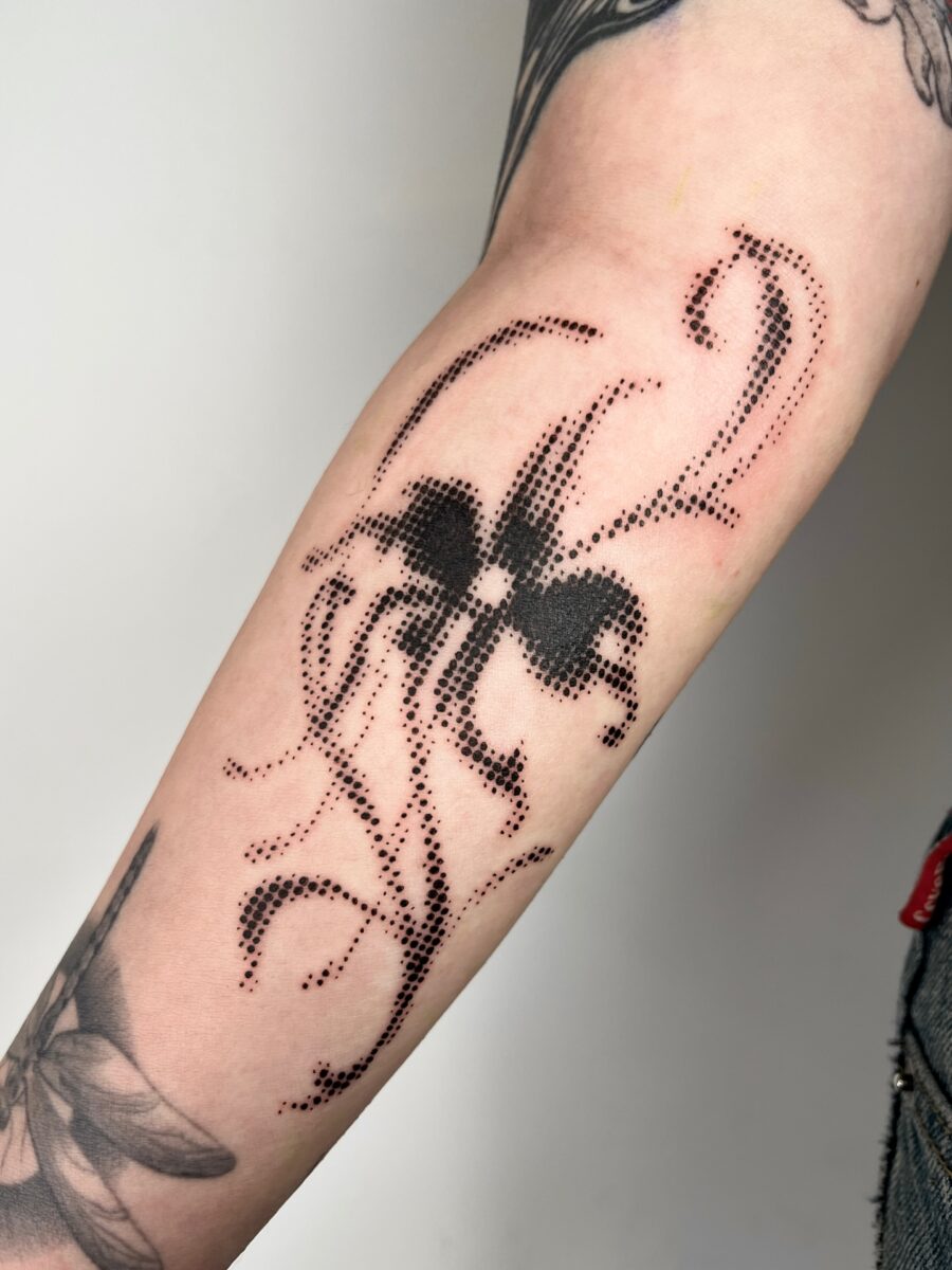 Intricate dotwork forming a whimsical floral design