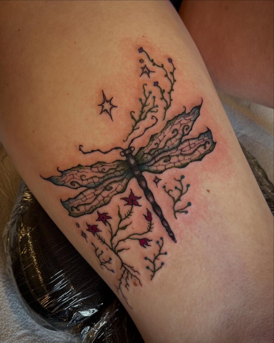 Delicate dragonfly with floral accents