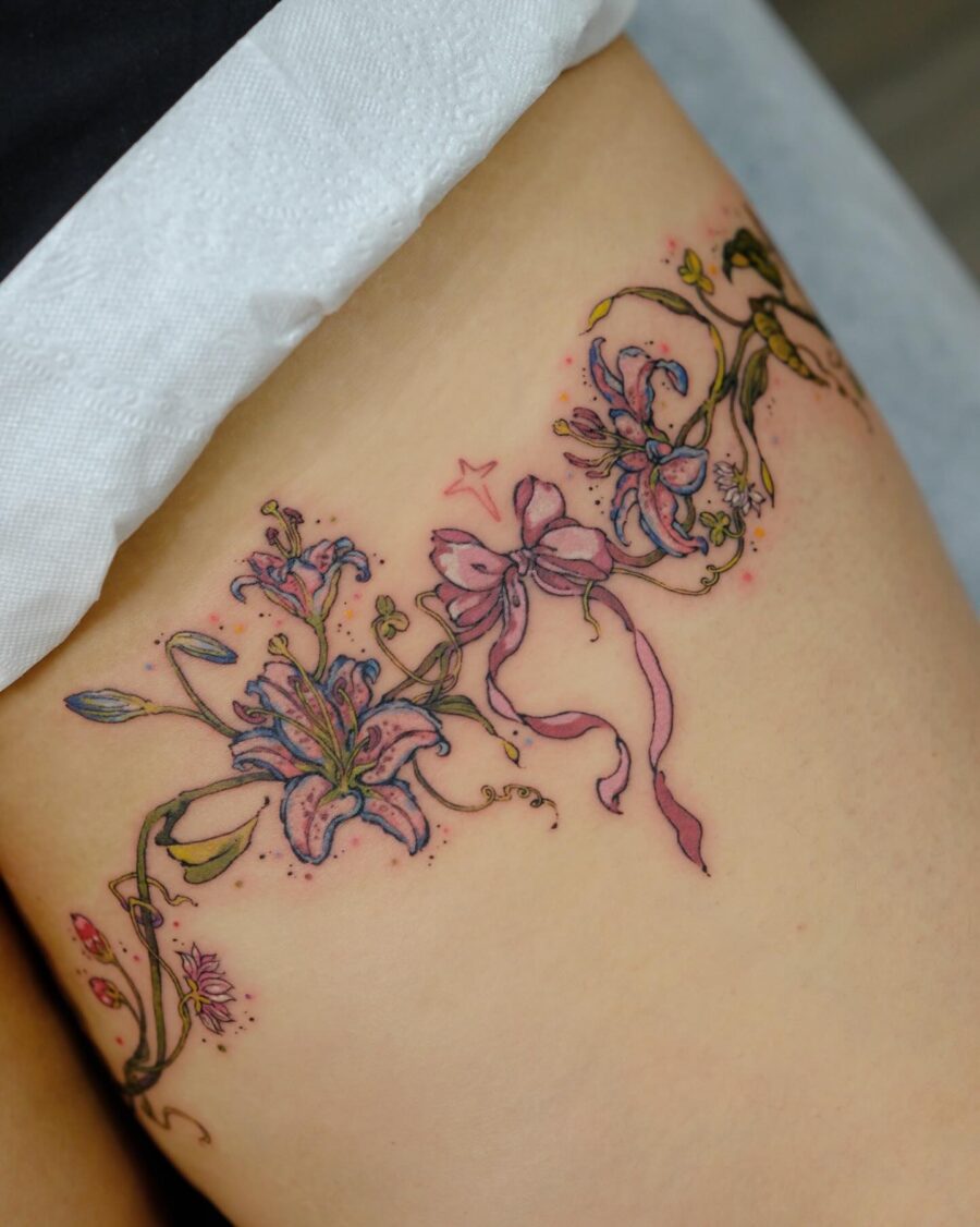Delicate floral tattoos with playful ribbons