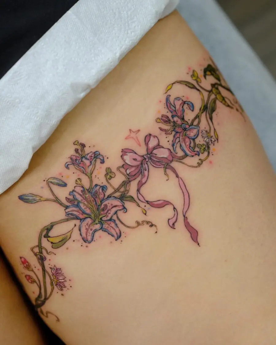 Delicate floral tattoos with playful ribbons
