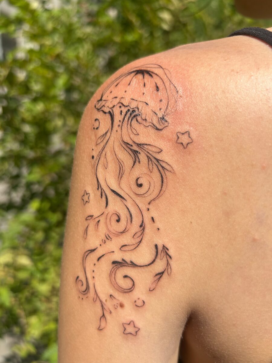 Dreamy jellyfish tattoo with flowing elegance